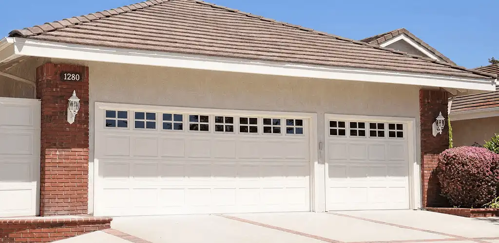 Residential garage door repair service for a double garage door in Aurora, IL