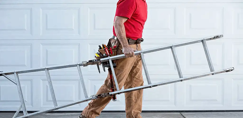 Garage door repair technician arriving with tools and ladder in Aurora, IL