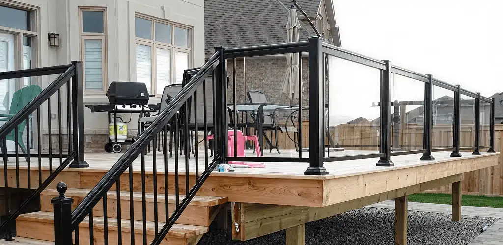 Handrail installation on a deck staircase for safety and code compliance in Aurora, IL